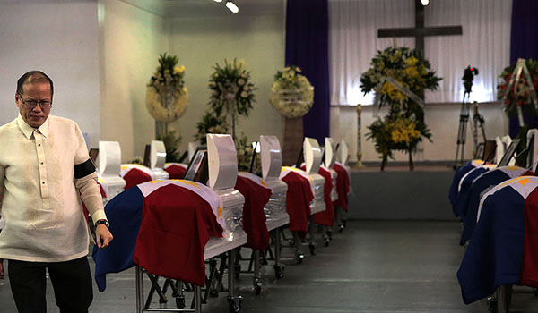 Aquino leaving after the necrological service